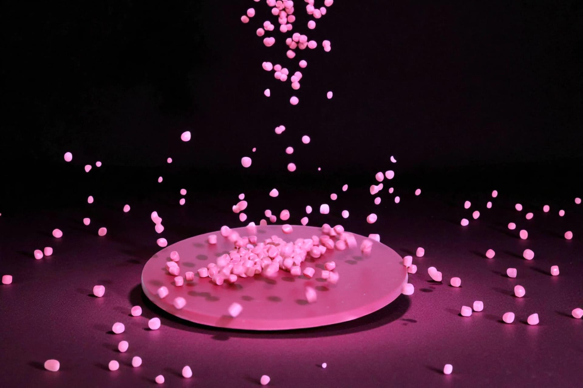 Pink plastic granules